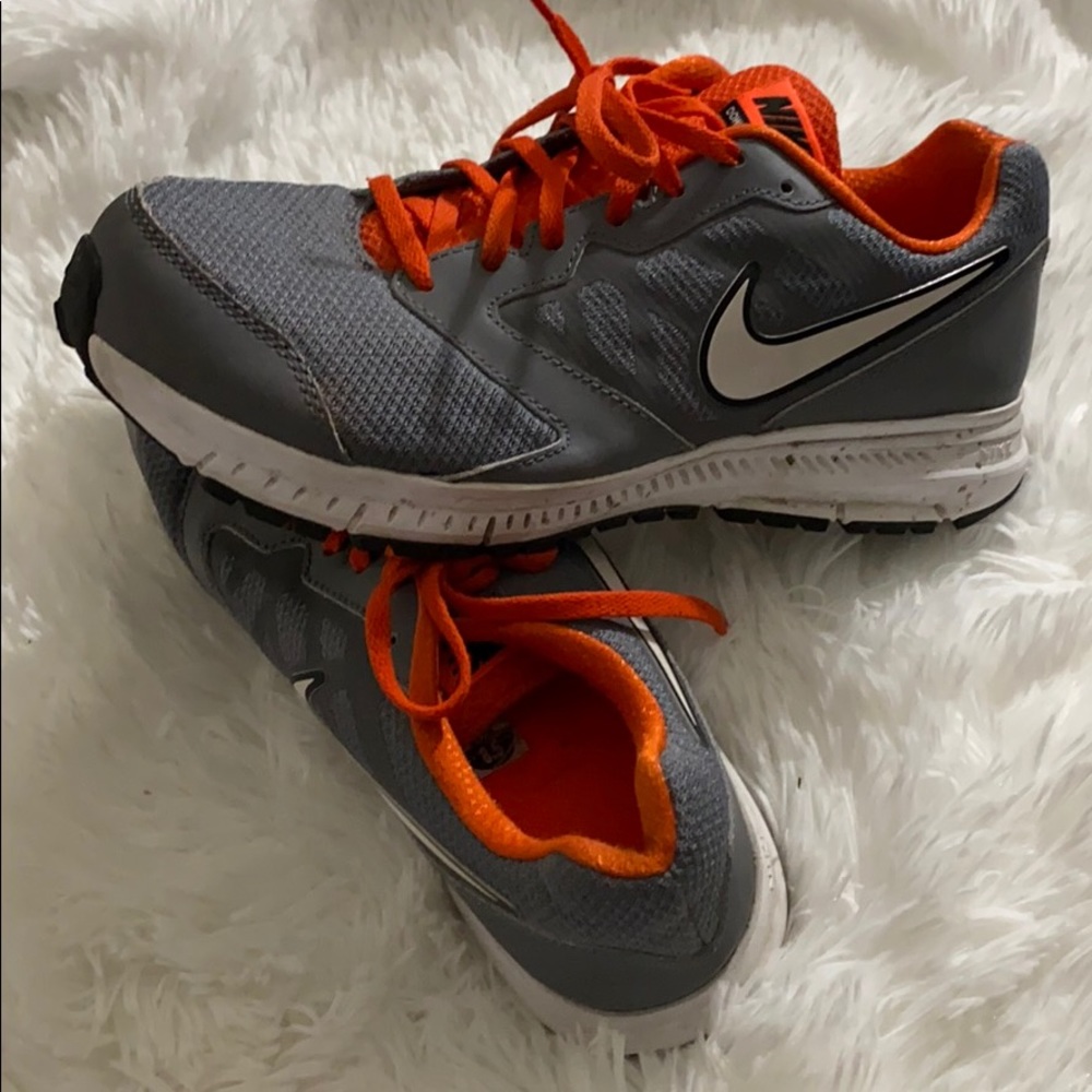 Nike’s gray and orange